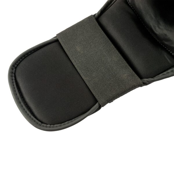 PROTECTOR PIERNA PROFESIONAL UFC